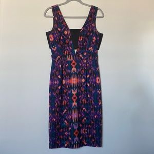 Midi dress with abstract, colorful pattern and cutouts. Size - 4. Gianni Bini.
